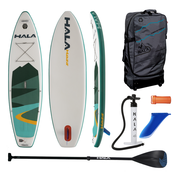 Complete Hala Hoss inflatable paddle board kit, featuring a board with green, blue, and yellow mountain design deck pad. Includes travel bag, dual-action hand pump, adjustable paddle, center fin, and repair kit.